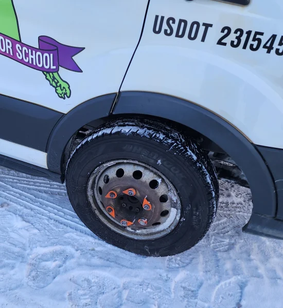 We hit a guardrail with our van. Screwed up the front wheel. Not going to make it to the Arctic Circle today.